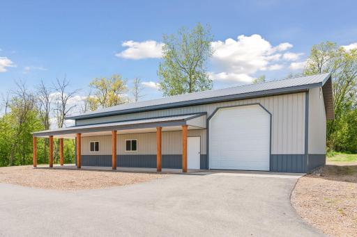 Amazing outbuilding with concrete floors, heat (on south half), 200 amp service