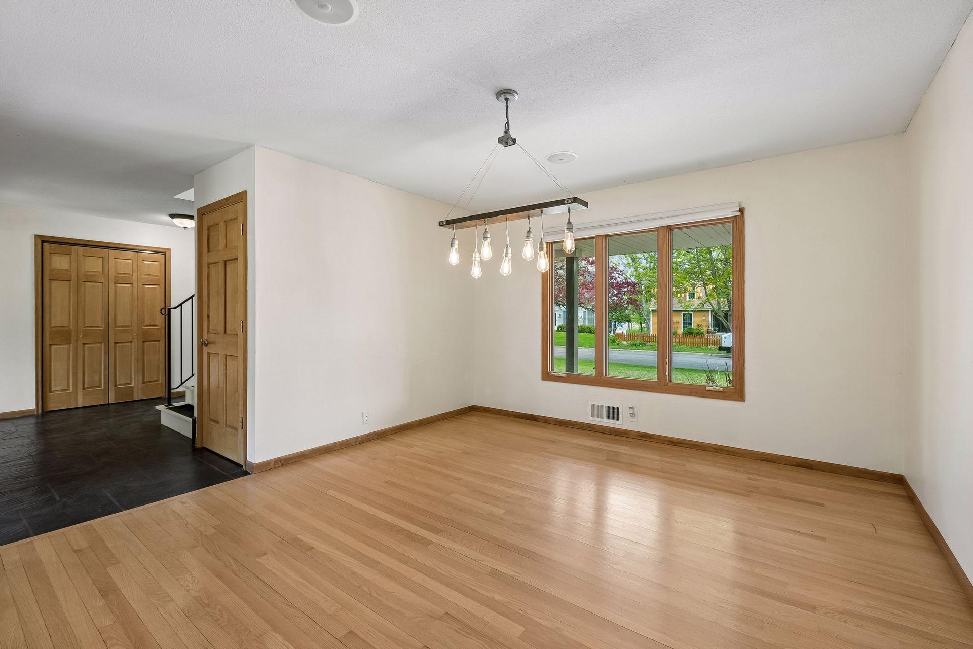 The generous dining room faces the front of the home.