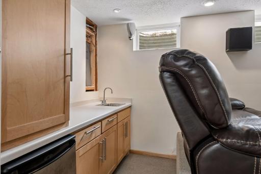 Basement: Home Theater Room Wet-bar and mini-fridge.