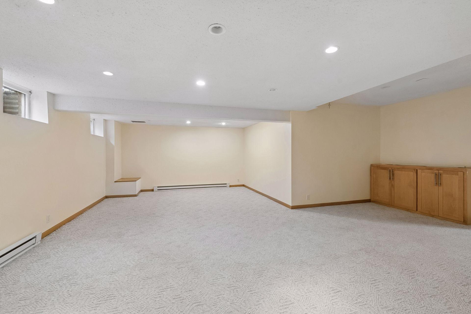 Basement: Alternate view of Lower Recreation Room.