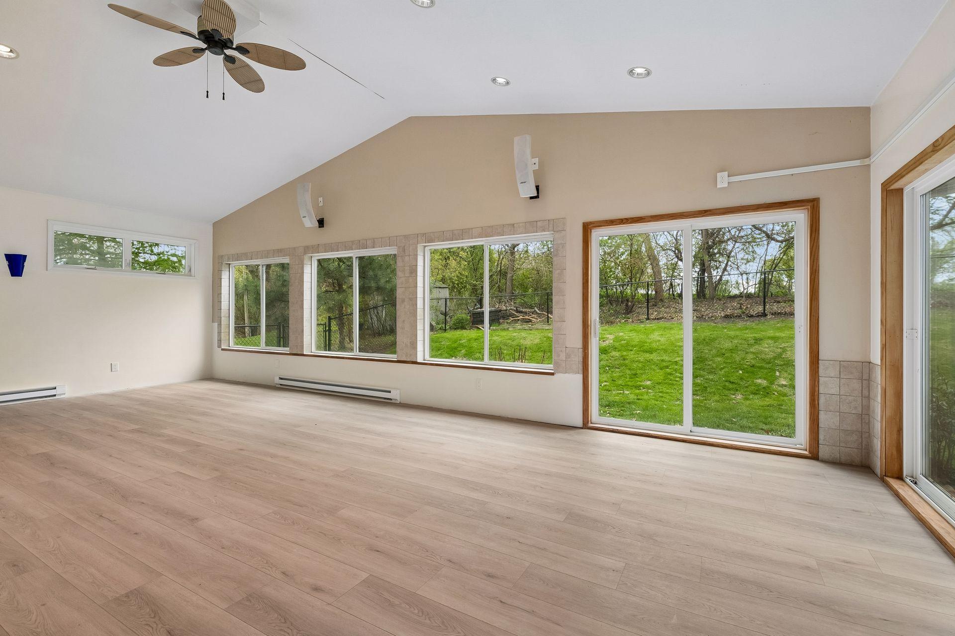 Enjoy sitting and relaxing while taking in the sunlight and overlooking the backyard!