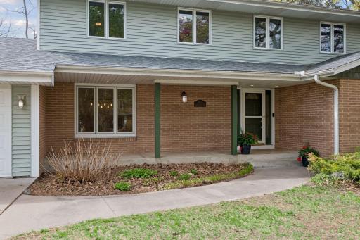 The covered front porch provides a welcoming entrance to your home!