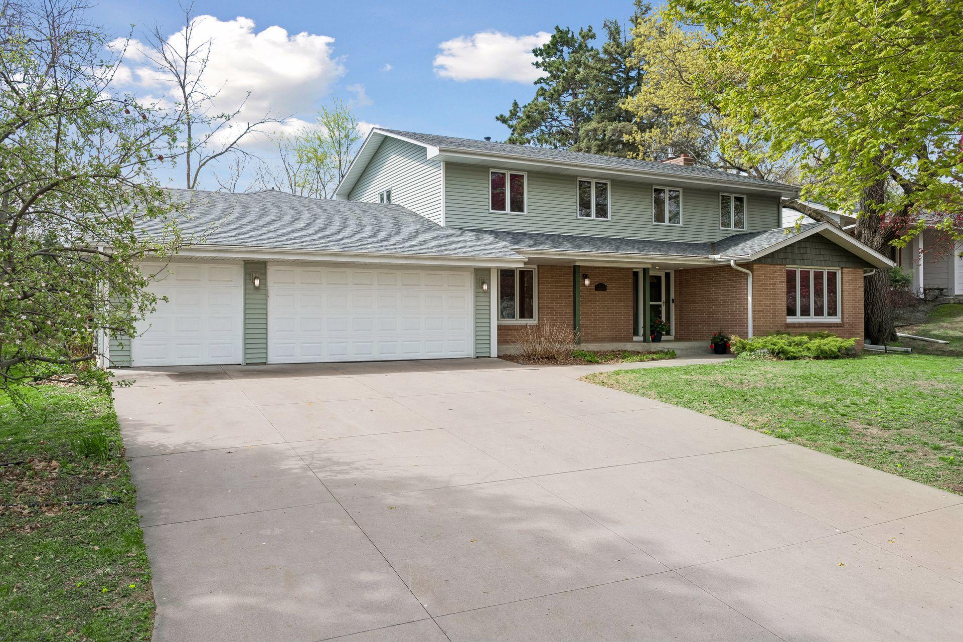 Welcome to 8817 Westmoreland Lane! You are sure to appreciate the three-stall garage and the generous off-street parking for guests!