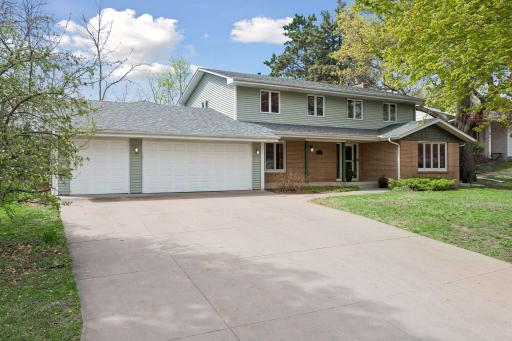 Welcome to 8817 Westmoreland Lane! You are sure to appreciate the three-stall garage and the generous off-street parking for guests!