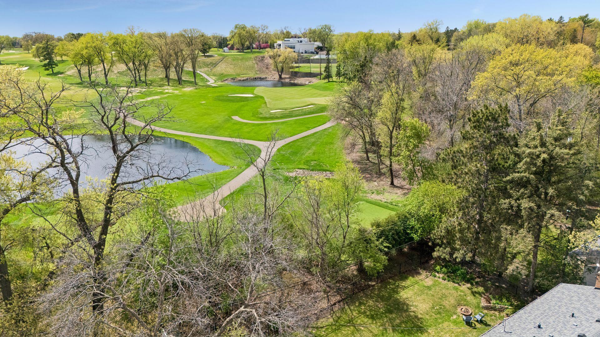 Aerial View of backyard and golf course .