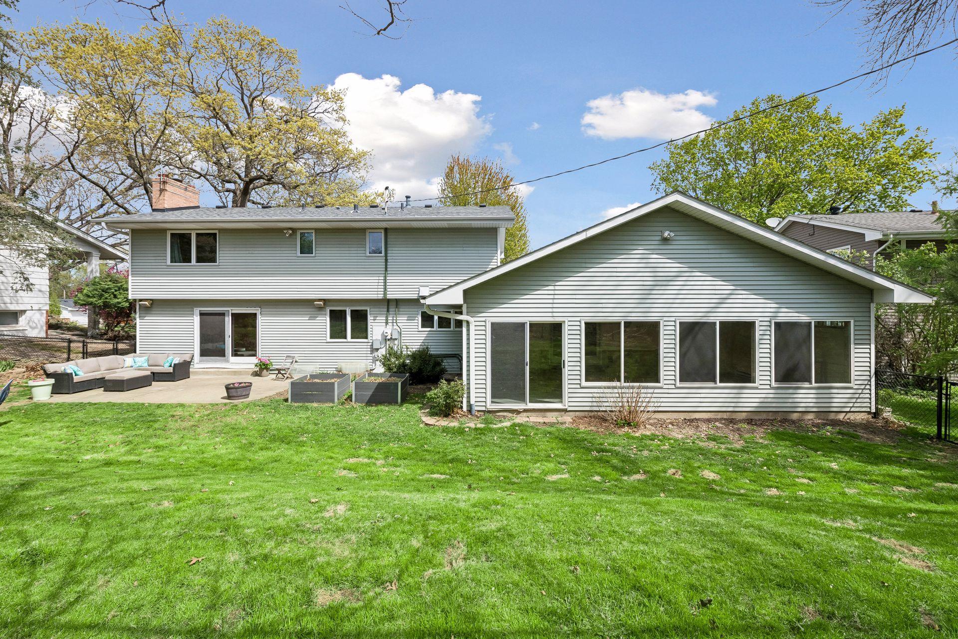 View of backyard and back of home.