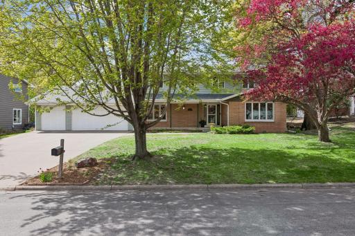You'll love the mature trees that line the curving streets and rolling hills that define this Westwood Hills neighborhood.
