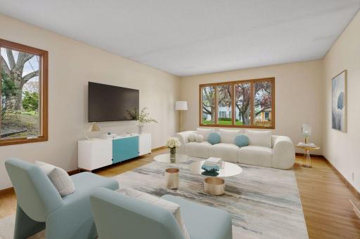 The expansive family room is great for large family gatherings. Virtually Staged.