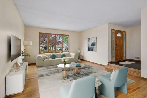 Main floor sitting / family room at the front of the home. Virtually Staged.