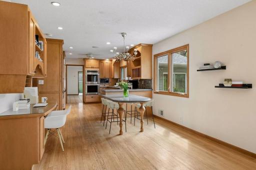 The kitchen was designed to accommodate both formal and informal dining affairs! Virtually Staged