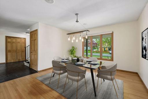 The generous dining room faces the front of the home. Virtually Staged.