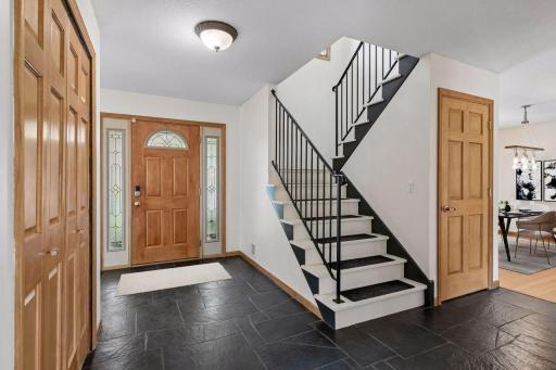 The spacious foyer, with coat closet, is a wonderful space for welcoming guests!