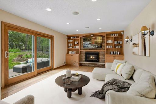 Step out onto the patio to enjoy your outdoor living room during the warmer months! Virtually Staged.