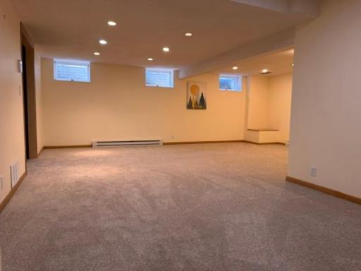 Check out the great lower level family room! A multitude of uses for whatever your family needs! Easy potential for additional bedrooms to be added.