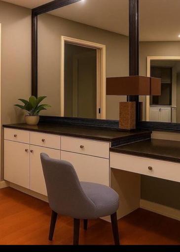 Vanity area outside of walk-in closet.jpg