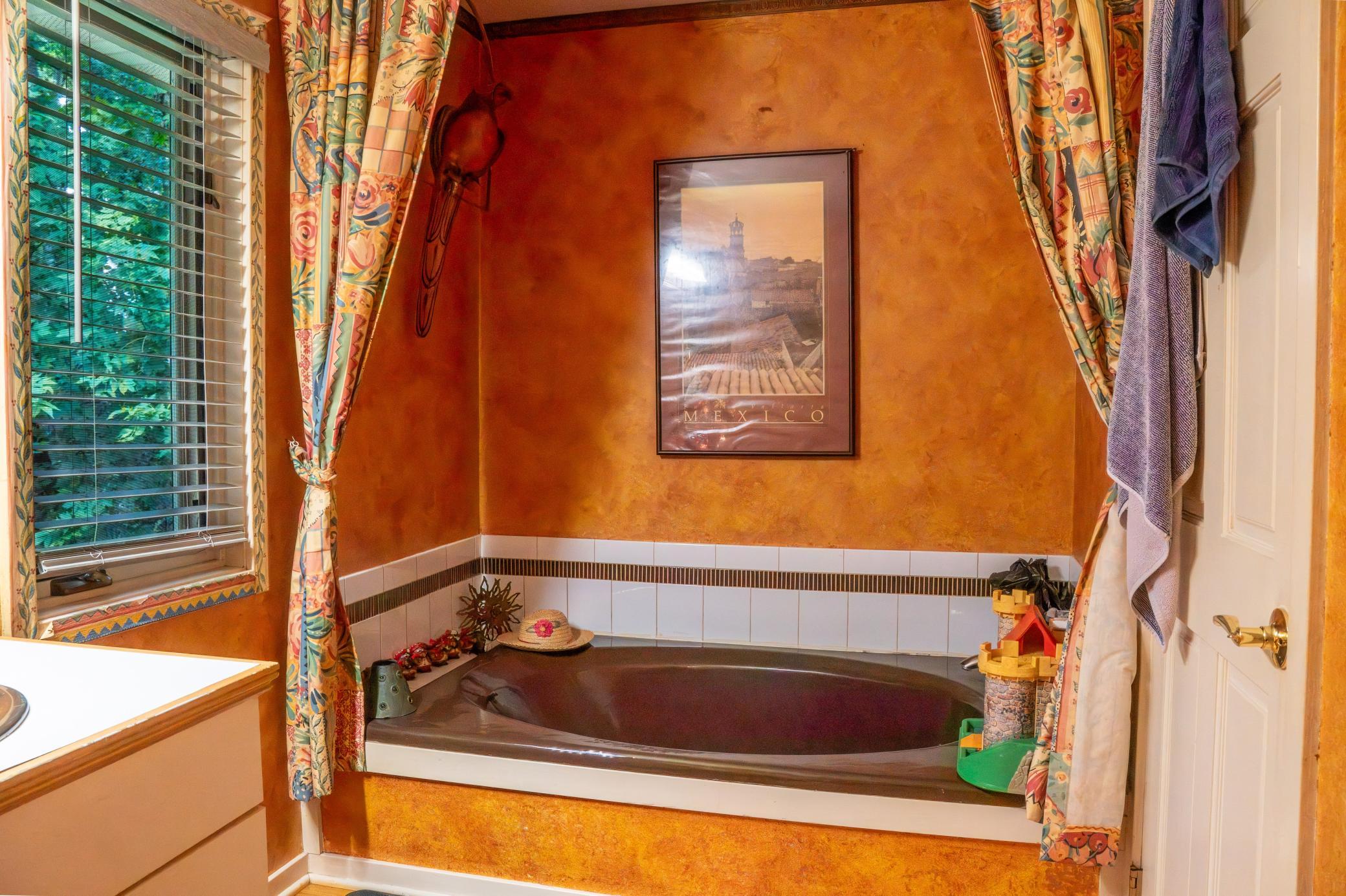 bathroom 1 tub area.jpeg