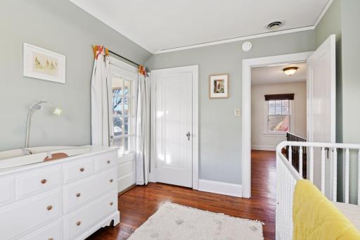 Bedroom 3 on the upper level currently used as a nursery.