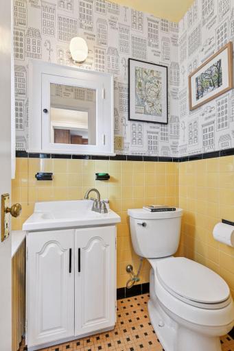 Vintage tile highlights the main floor powder room bathroom.