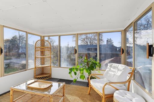 Lovely three-season sun porch on accessed from the second floor.