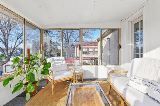 The three season porch faces West and gets so much natural light.