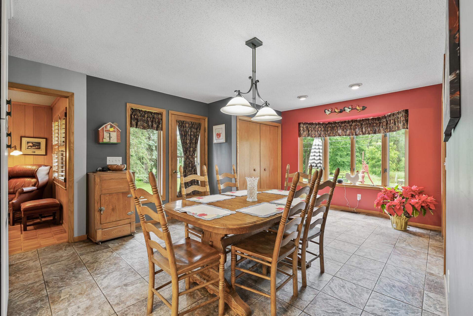 Large eating area with door to deck