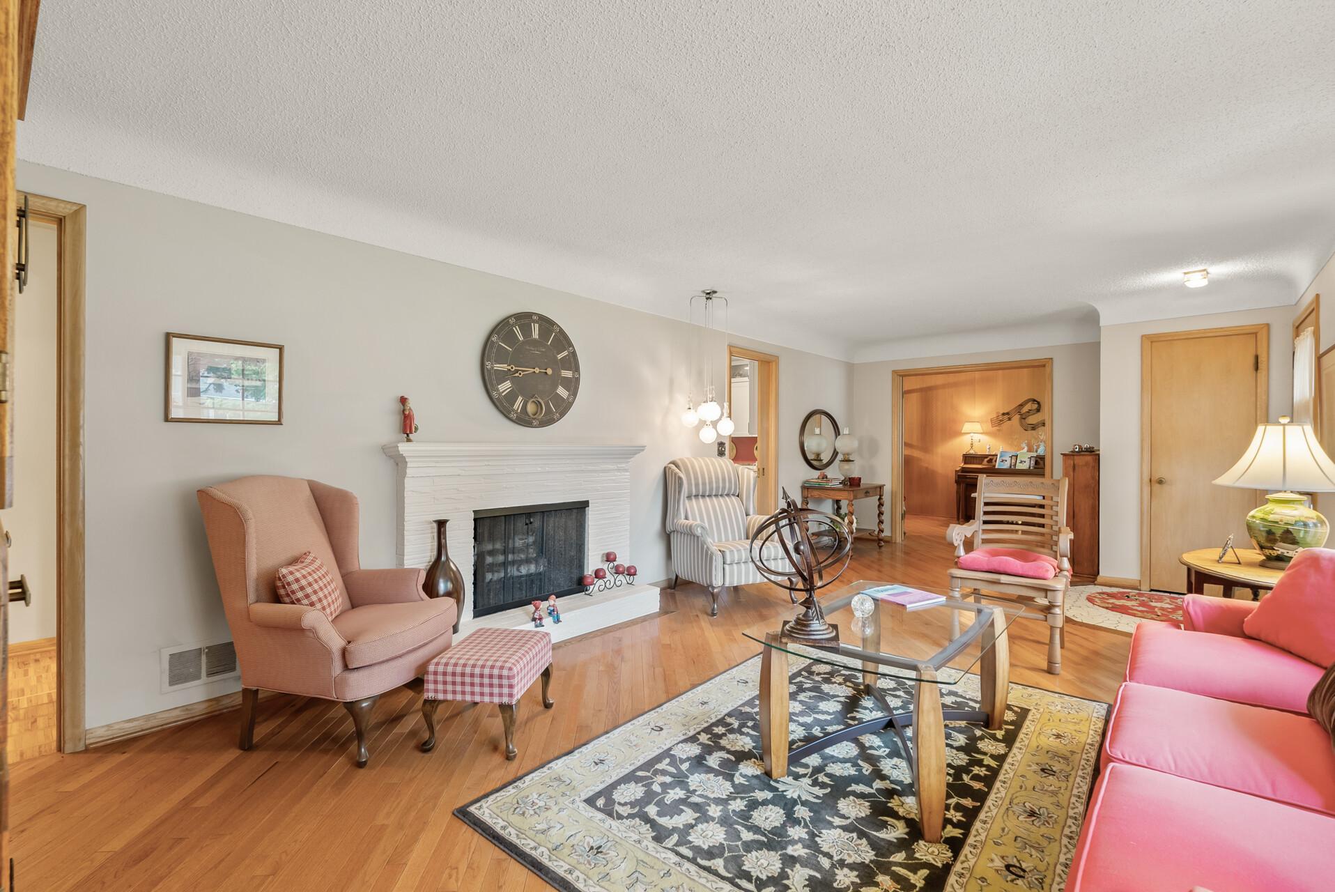 Wood burning fireplace and hardwood floors