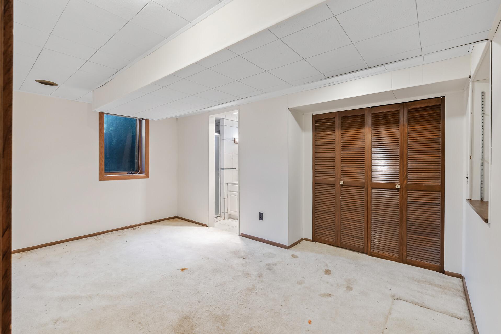 Lower level bedroom with bath-New carpet
