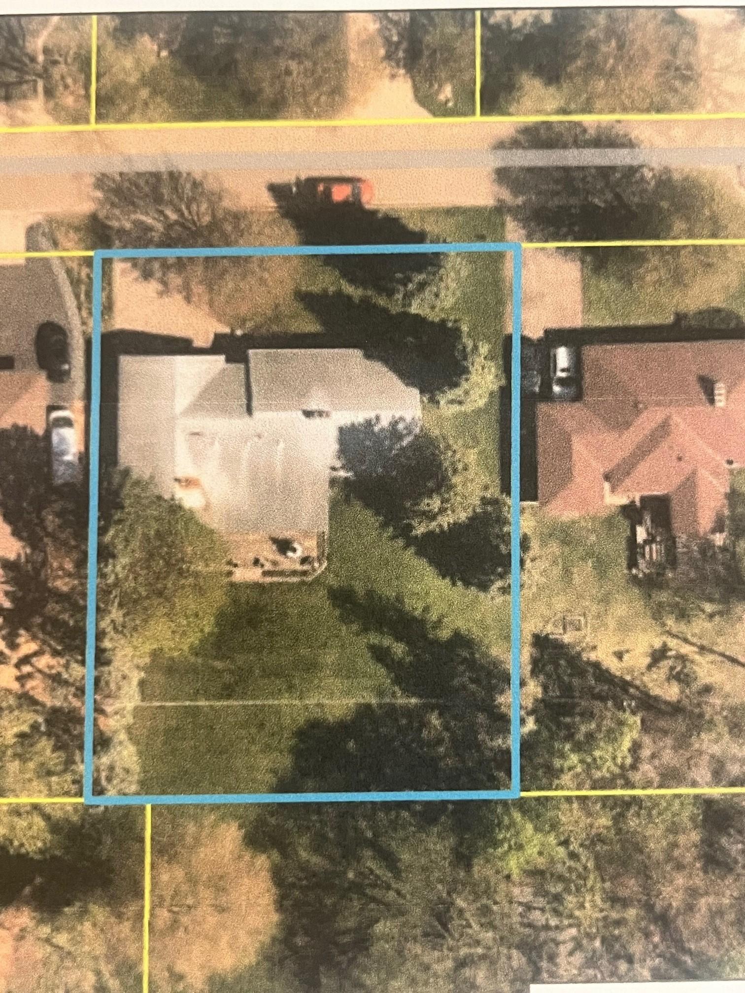 House sits on level .35 acre lot