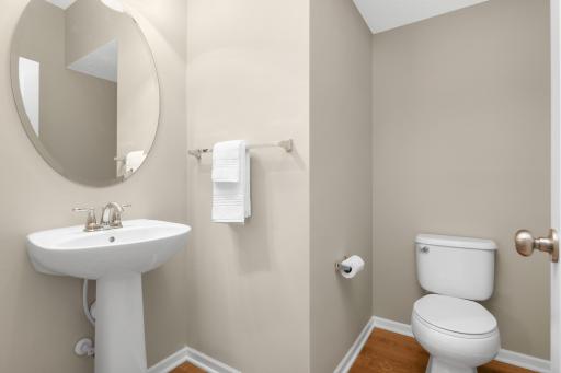 Convenient main-level half bath, ideally located for guests and everyday living.