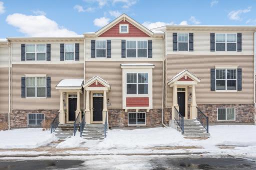 Impressive three-level townhome in an unbeatable Maple Grove location, offering exceptional walkability to Arbor Lakes, the community center, library, and a variety of restaurants and shops.