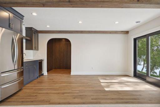 LL wet bar with view of oak slat wall - hidden in law entrance.jpg