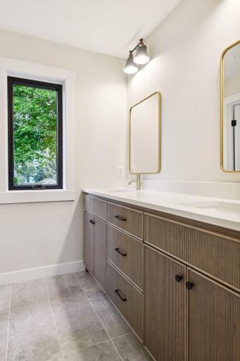 Upper level double vanity shared bath