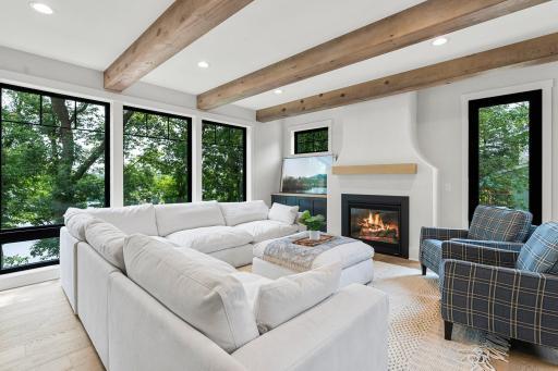 Custom fireplace w/ entrance to the back yard on right