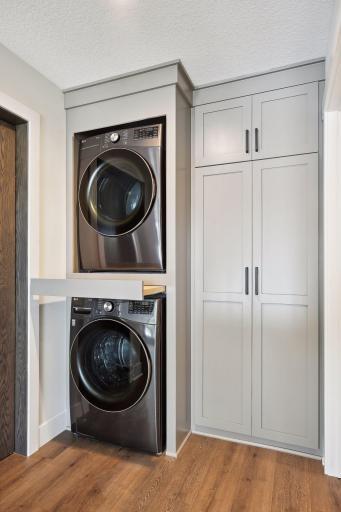 Guest suite laundry with pull out fold table