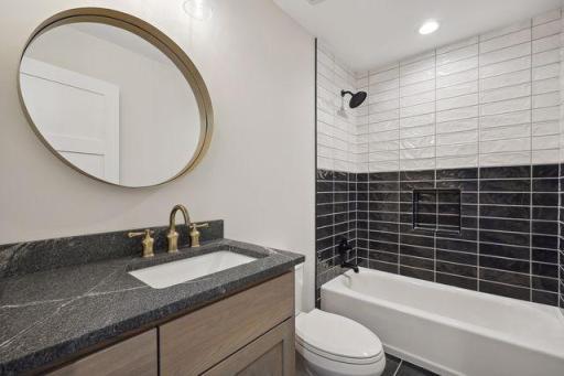 Guest suite full bath with custom tile.jpg