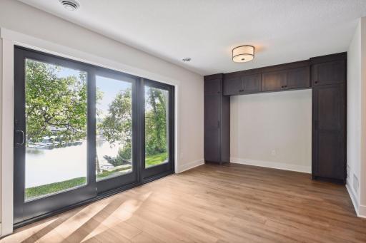 LL guest suite bed or couch area with closet surround