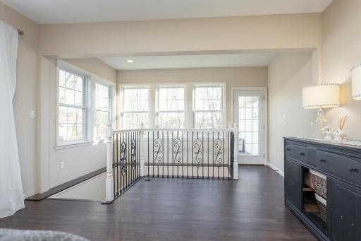 Living room on main looking steps to lower level