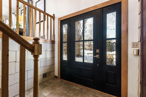 Entry area features new front door and large closet.