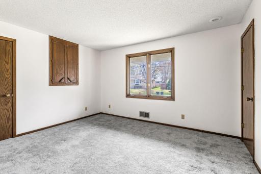 Second bedroom also has newer carpet and multiple closets.