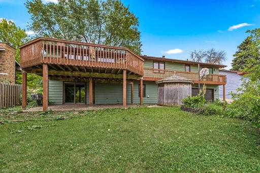 Large deck extends from dining room all the way to primary suite.
