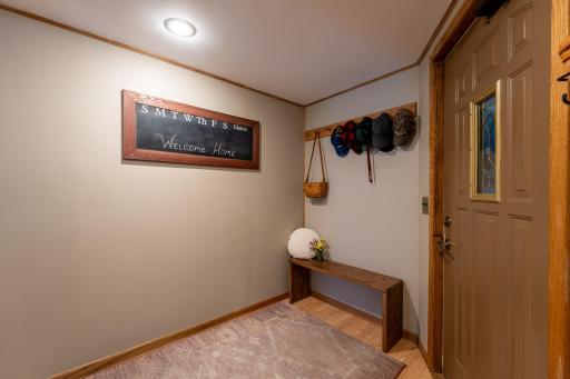 The entrance from the garage has a large foyer with closet.