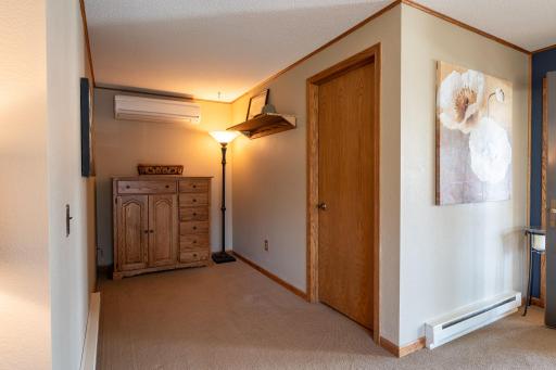 Walk-in closet plus alcove for dresser or armoire.