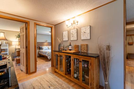 Another great idea for this area is a buffet area, dry bar or maybe bookshelves.