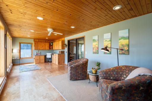 The sunroom has a private access and can be a home business, hobby room, nursery, or work out space.
