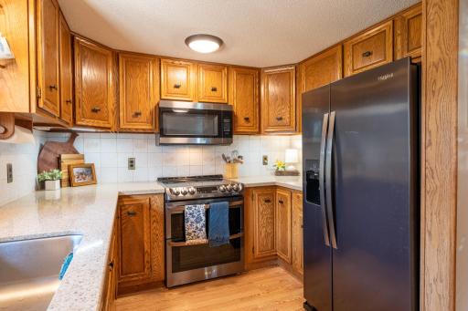 You'll appreciate the ample cabinet space and countertop work areas for food prep.