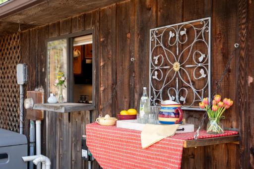 The hinged serving area makes a great beverage area.