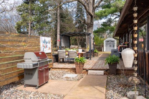 The grilling area is close to the kitchen.