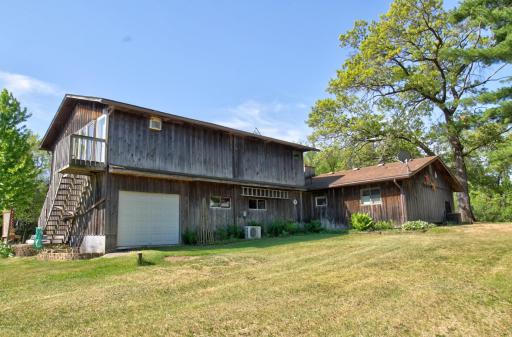 From this angle you can see the staircase to the sunroom and the overhead garage door for the third garage stall.