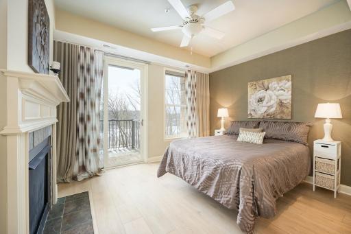 This amazing bedroom has everything! Views, fireplace, access to balcony with a large walk-in closet and just steps from the luxurious bathroom.