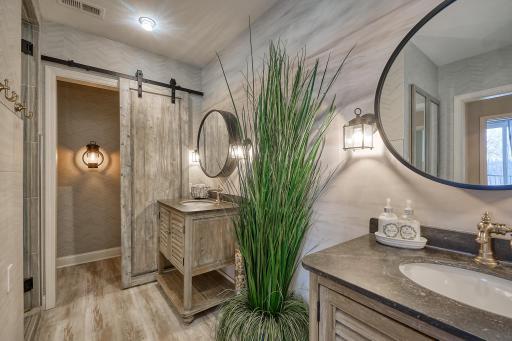 Bathroom boasts elegant designer finishes.